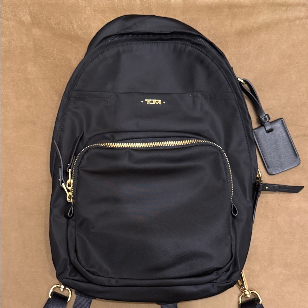 Tumi Women's Black Backpack with Gold Accents